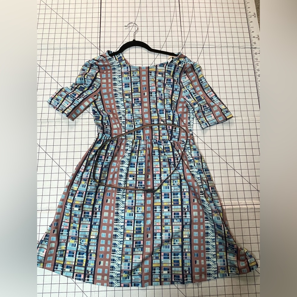 Yumi dress in excellent condition, only flaws noted slight wear on waist belt.